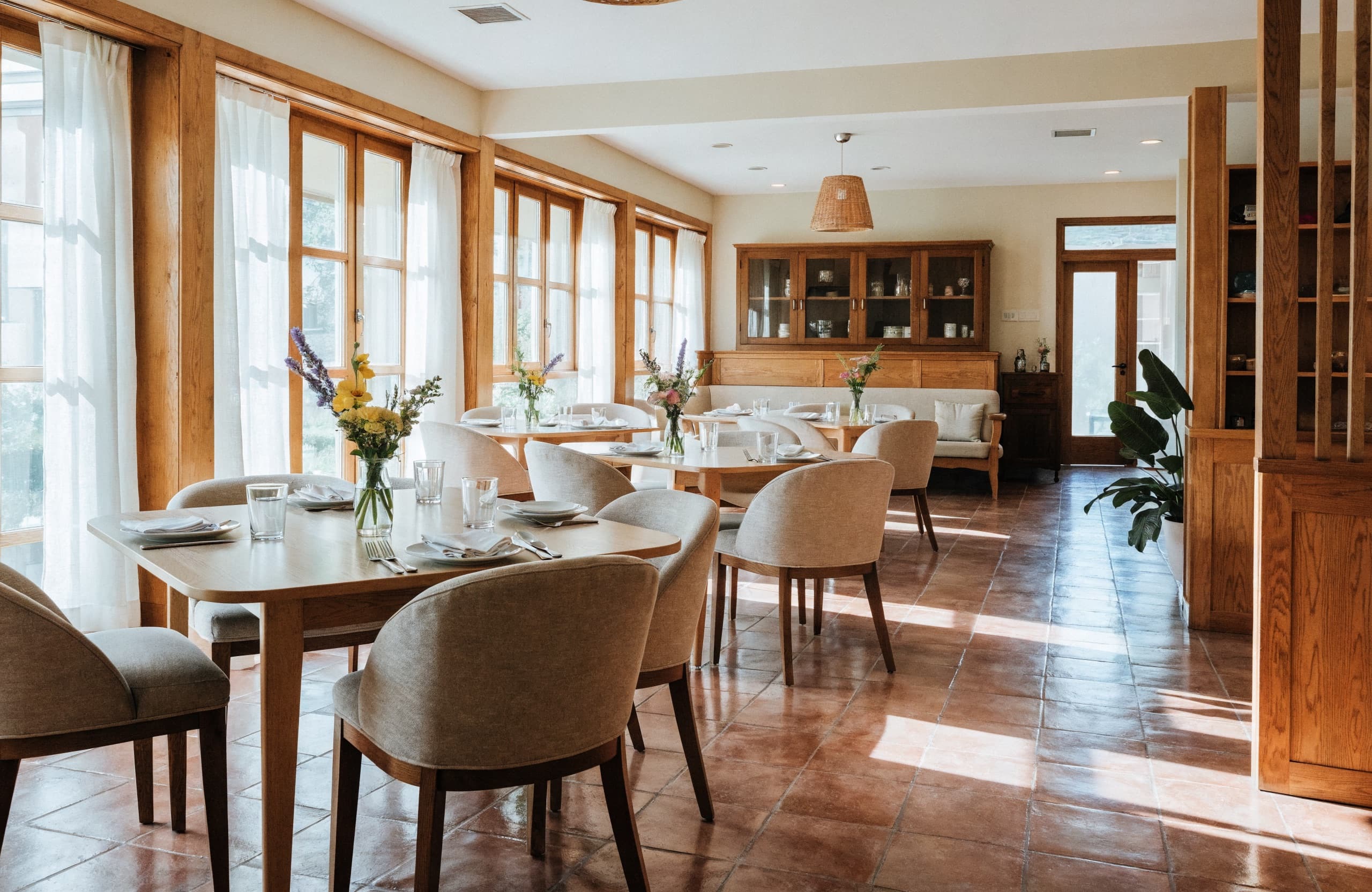 A welcoming dining room set for a meal